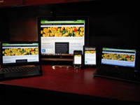 Image of a responsive website on multiple devices.