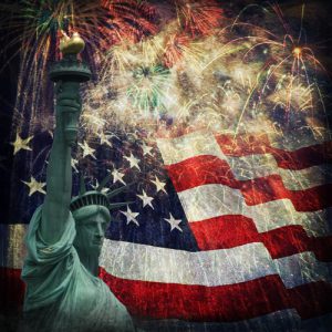 Composite photo of the statue of Liberty with a flag and fireworks in the background. Given a grunge overlay for a nice aged effect.  Nice patriotic image for Independence Day, Memorial Day, Veterans Day and Presidents Day.