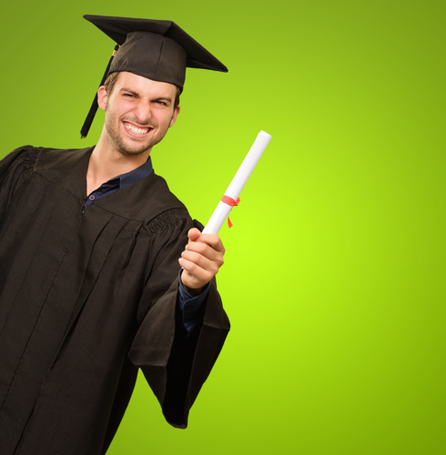 Young Man In Graduation Gown Holding Certificate On Green Background